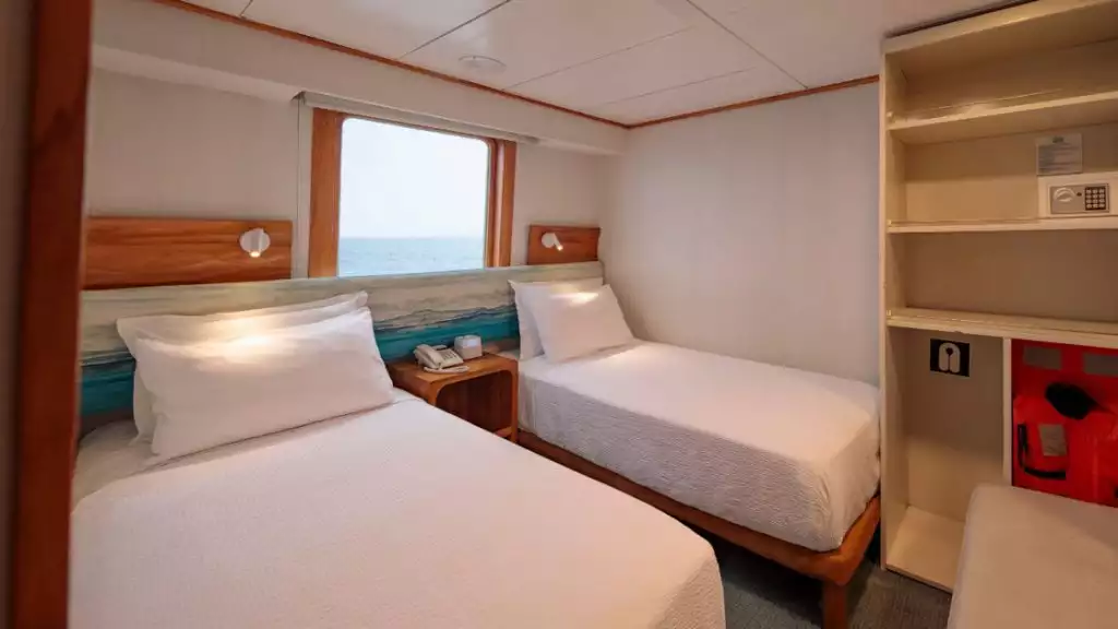 Junior cabin with twin beds aboard Coral I