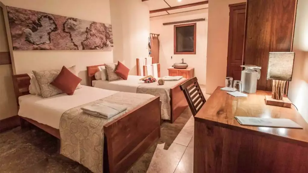 Twin bedroom of Family suite at Galapagos Safari Camp