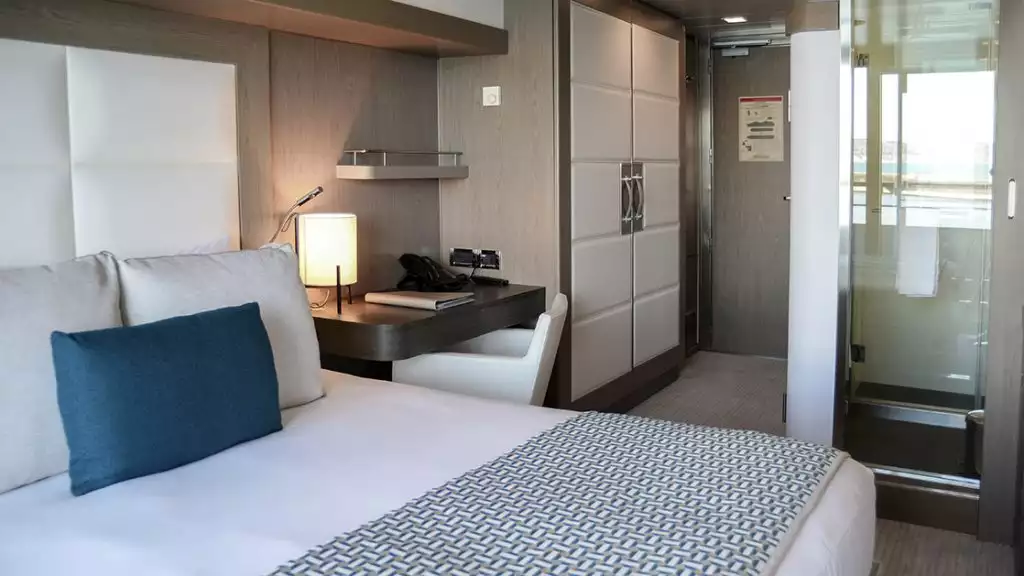 Prestige Stateroom - Decks 4, 5 & 6 with king bed aboard L'Austral. Photo by: Tamar Sarkissian/Ponant