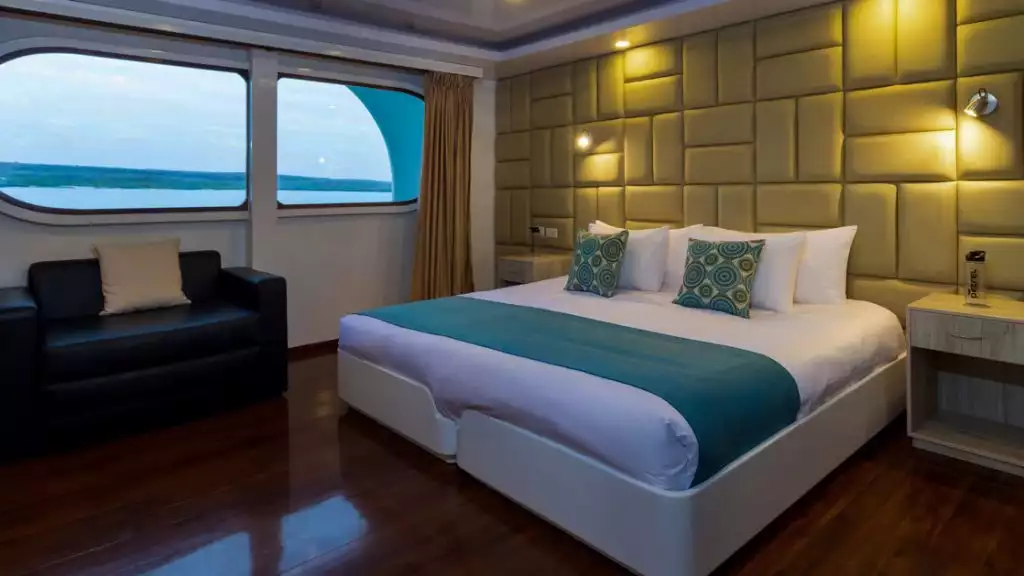 Golden Stateroom with king-size matrimonial bed aboard Petrel