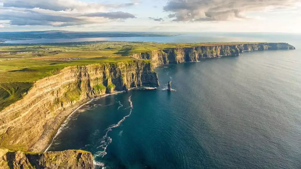 ariel view of Insane cliffs in ireland right along the ocean