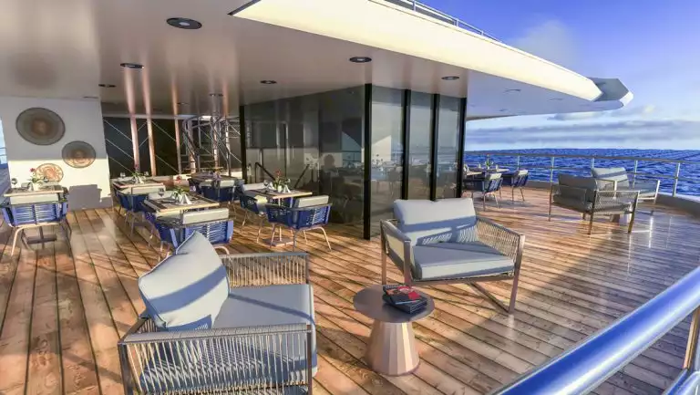 Rendering of Upper Deck al fresco dining area on Hermes Galapagos yacht with modern blue chairs at round tables atop teak deck.