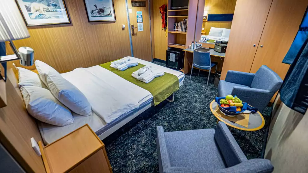 Owner's Cabin with double bed aboard Quest. Photo by: Eirik Grønningsæter