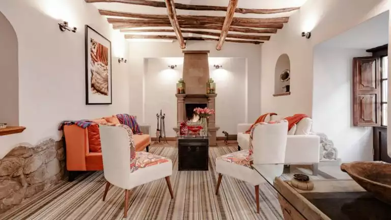 lounge area in Andenes boutique hotel with white walls and wood design,