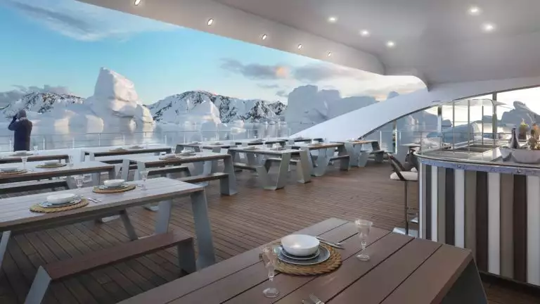 Rendering of al fresco BBQ area with buffet, tables, benches & place settings on Magellan Discoverer ship.