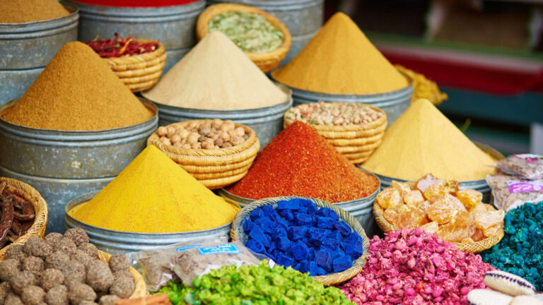 Selection of colorful spices on a traditional Moroccan market in Marrakech, Morocco