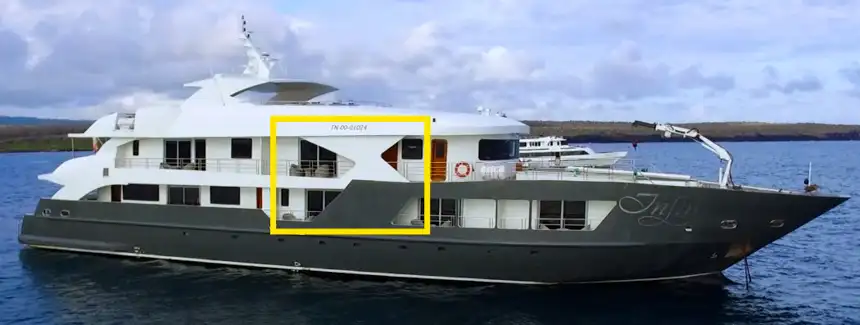 Screenshot of small ship infinity with yellow box to highlight the obstructed views from the cabins