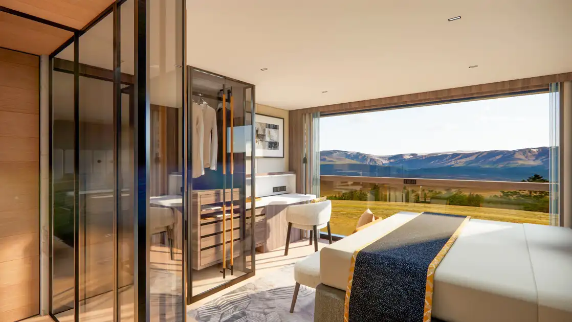 Cabin on National Geographic Connect with modern wood, stone & glass decor, sash window balcony, bathroom, closet & desk.