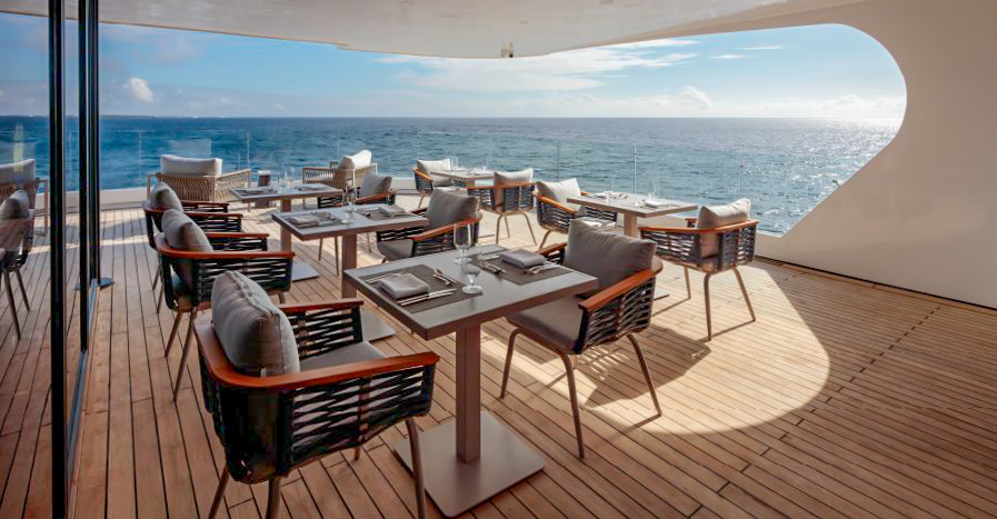 The Panoramic Deck dining area aboard Hermes Galapagos catamaran
